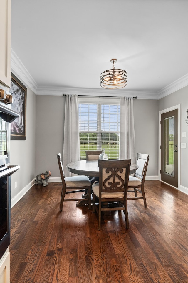 4999 Crescent Ln, Murfreesboro, TN 37128 - dining room with crown molding, dark wood-type flooring, a chandelier, and baseboards