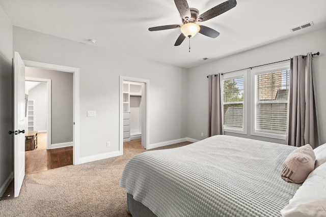 4999 Crescent Ln, Murfreesboro, TN 37128 - carpeted bedroom with baseboards, a spacious closet, and a ceiling fan