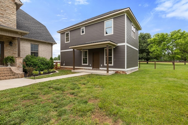 4999 Crescent Ln, Murfreesboro, TN 37128 - view of front facade featuring a front lawn, a patio area, and roof with shingles