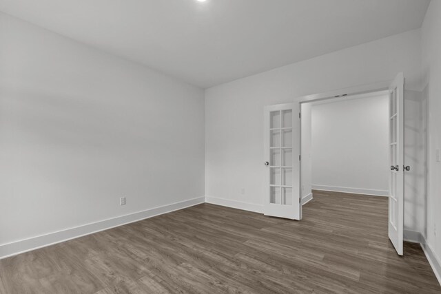 310 Carver Ln, Lebanon, TN 37087 - unfurnished bedroom with baseboards and dark wood-type flooring