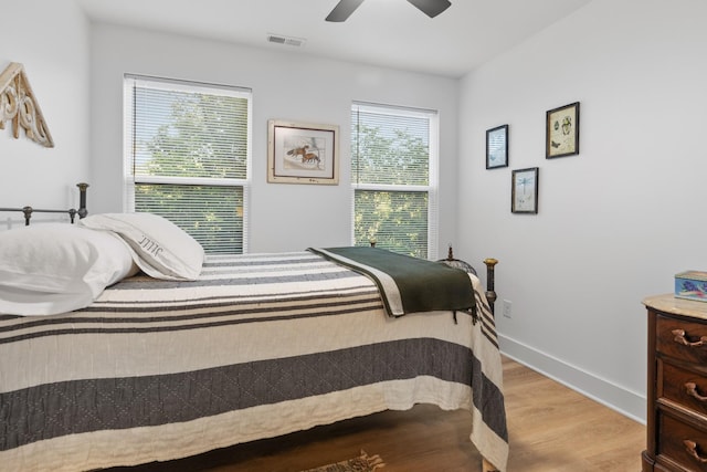 726 Morgan Ave, Woodbury, TN 37190 - bedroom featuring wood finished floors, a ceiling fan, and baseboards