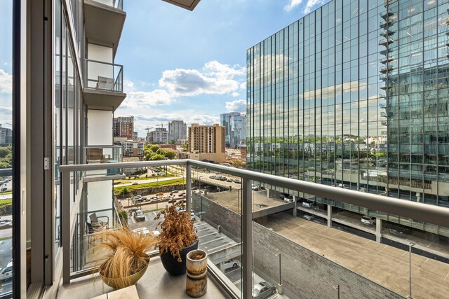 balcony featuring a city view