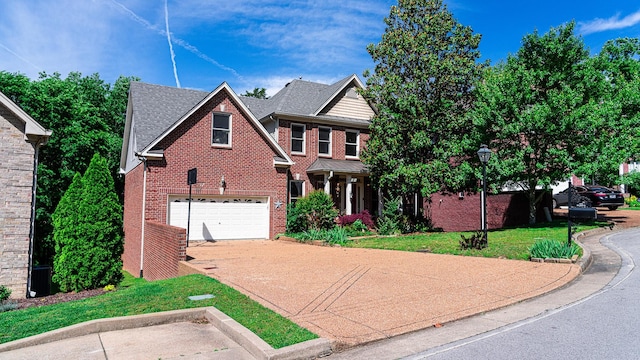 traditional home with driveway, brick siding, a garage, a front lawn, and central AC unit