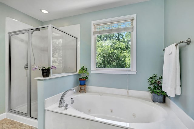 617 Bayhill Ct, Hermitage, TN 37076 - bathroom with a stall shower and a jetted tub
