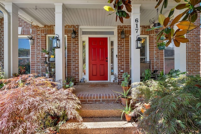 617 Bayhill Ct, Hermitage, TN 37076 - property entrance featuring brick siding and a porch