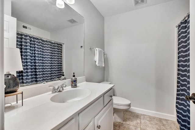 617 Bayhill Ct, Hermitage, TN 37076 - full bath with vanity, toilet, tile patterned floors, a shower with shower curtain, and baseboards