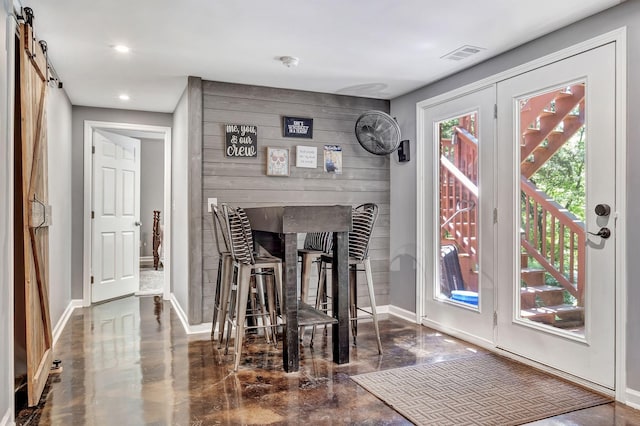 617 Bayhill Ct, Hermitage, TN 37076 - dining area with baseboards, recessed lighting, a barn door, and wooden walls