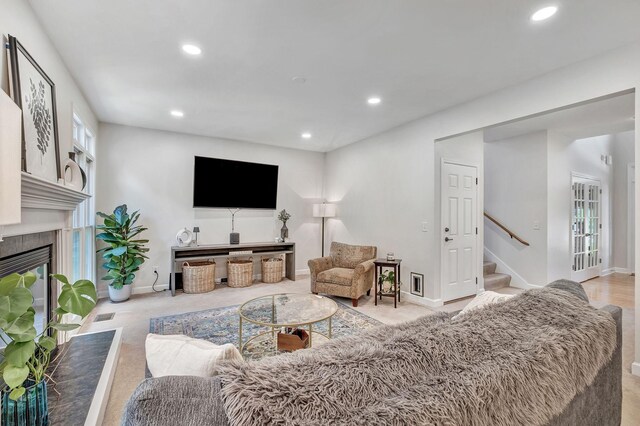 617 Bayhill Ct, Hermitage, TN 37076 - carpeted living room featuring recessed lighting, stairs, a fireplace, and baseboards