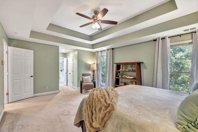 617 Bayhill Ct, Hermitage, TN 37076 - bedroom with carpet, baseboards, multiple windows, and a tray ceiling