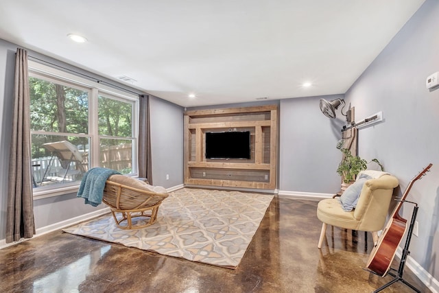 617 Bayhill Ct, Hermitage, TN 37076 - living area featuring concrete floors, baseboards, and recessed lighting