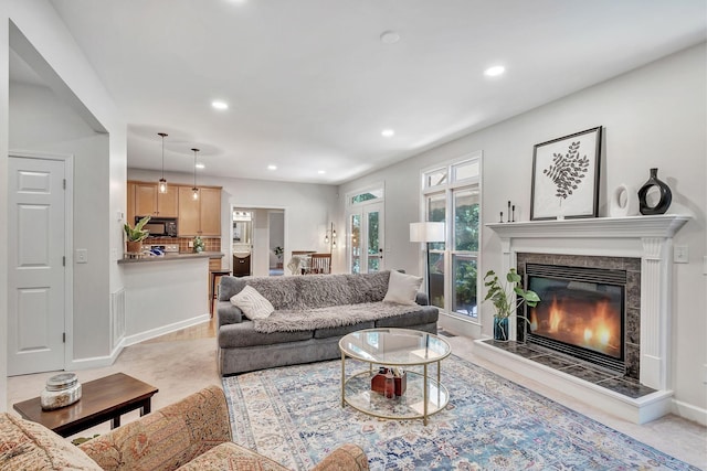 617 Bayhill Ct, Hermitage, TN 37076 - living room with recessed lighting, a tile fireplace, and baseboards