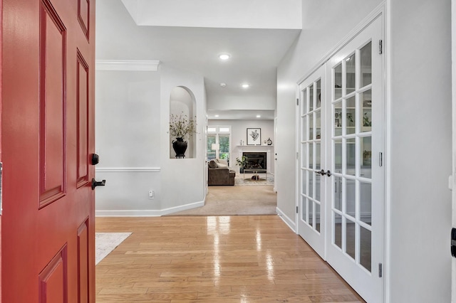 617 Bayhill Ct, Hermitage, TN 37076 - entrance foyer with baseboards, french doors, light wood-style flooring, recessed lighting, and a fireplace