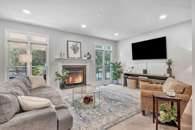617 Bayhill Ct, Hermitage, TN 37076 - living room featuring carpet, a glass covered fireplace, and recessed lighting