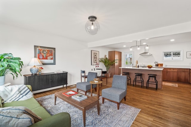 living room featuring light wood-style floors and recessed lighting
