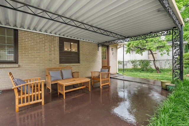 view of patio / terrace featuring fence