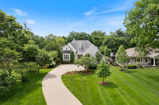 view of front of house featuring a front yard and driveway