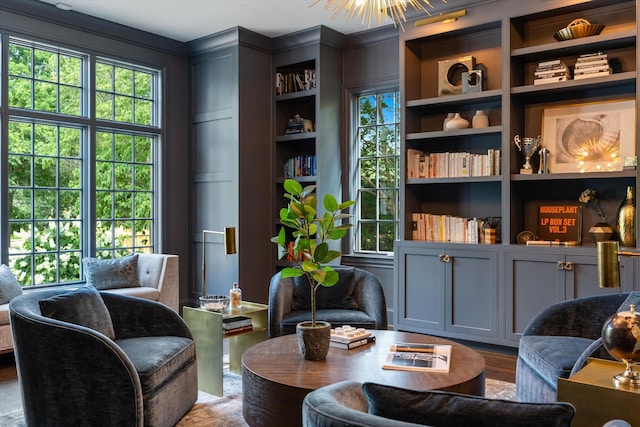 living area featuring built in shelves