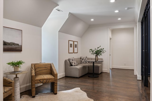 sitting room featuring recessed lighting, wood finished floors, baseboards, and lofted ceiling