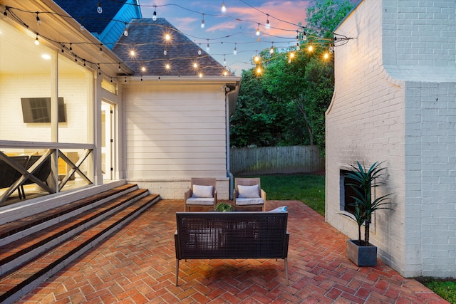 view of patio with fence and outdoor lounge area