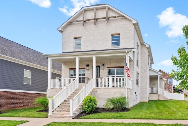 372 Augusta Ave, Pleasant View, TN 37146 - view of front of property with a porch, a front yard, brick siding, and stairway