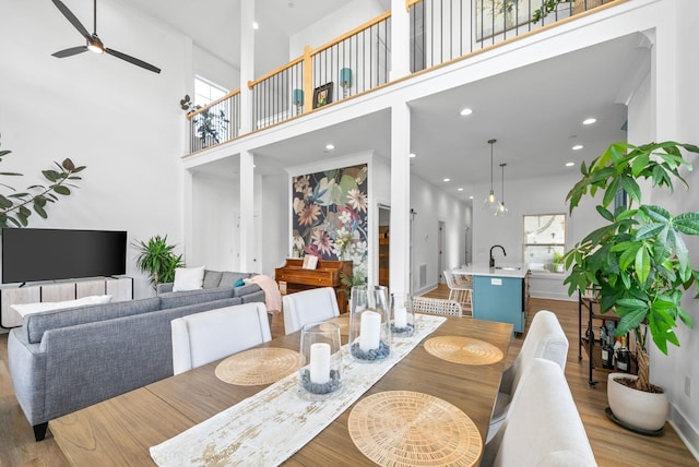 372 Augusta Ave, Pleasant View, TN 37146 - dining area featuring a ceiling fan, plenty of natural light, wood finished floors, a high ceiling, and recessed lighting