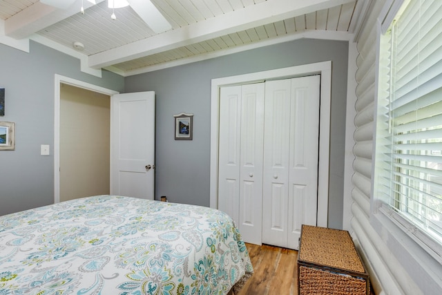 7547 Elm Springs Rd, Orlinda, TN 37141 - bedroom with wood finished floors, a closet, a ceiling fan, and a wooden ceiling with exposed beams
