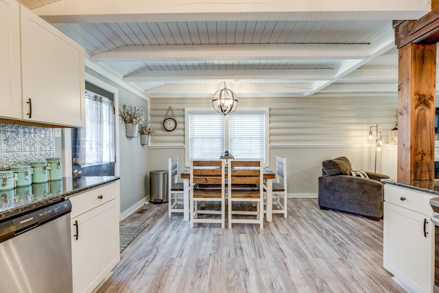 7547 Elm Springs Rd, Orlinda, TN 37141 - dining area with plenty of natural light, light wood-style flooring, beam ceiling, and a chandelier