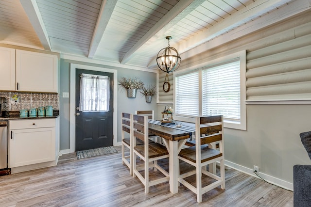 7547 Elm Springs Rd, Orlinda, TN 37141 - dining space featuring a chandelier, beam ceiling, and light wood-type flooring