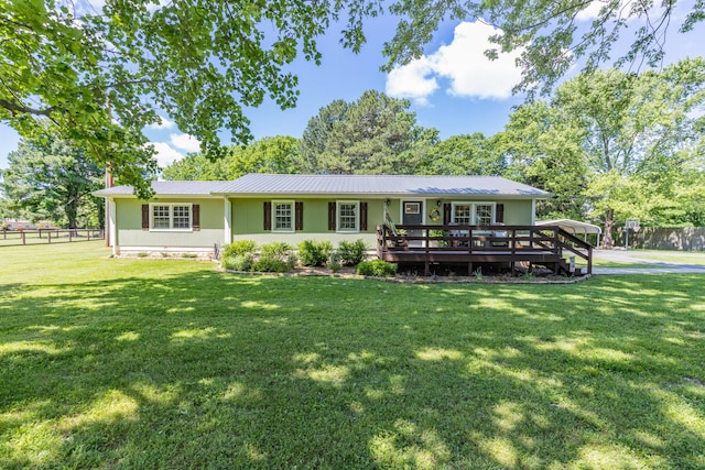 7547 Elm Springs Rd, Orlinda, TN 37141 - view of front facade with a wooden deck and a metal roof