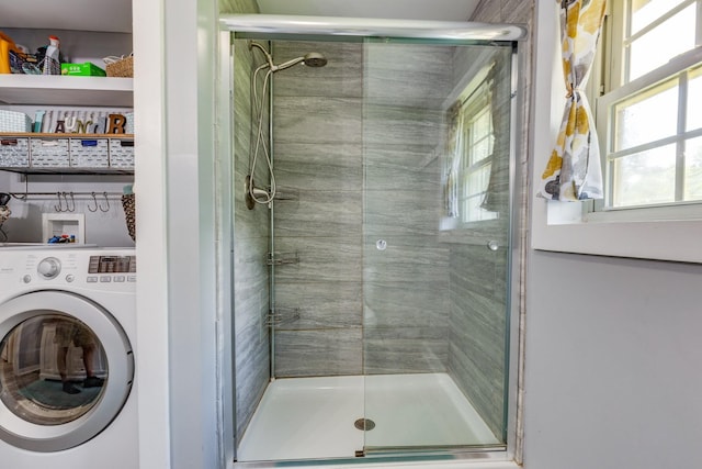 7547 Elm Springs Rd, Orlinda, TN 37141 - bathroom featuring washer / dryer and a shower stall