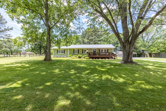 7547 Elm Springs Rd, Orlinda, TN 37141 - view of front of property featuring a deck and a metal roof