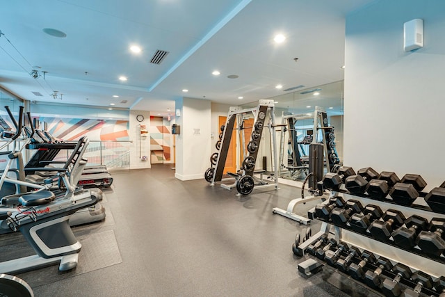 gym with recessed lighting and baseboards
