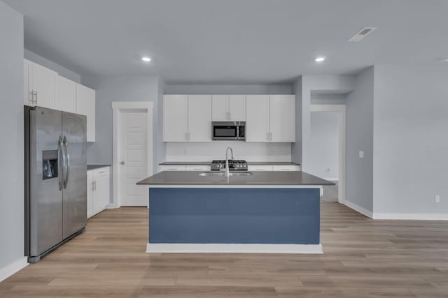 118 Merion Way, Lebanon, TN 37087 - kitchen with appliances with stainless steel finishes, a sink, baseboards, light wood finished floors, and recessed lighting