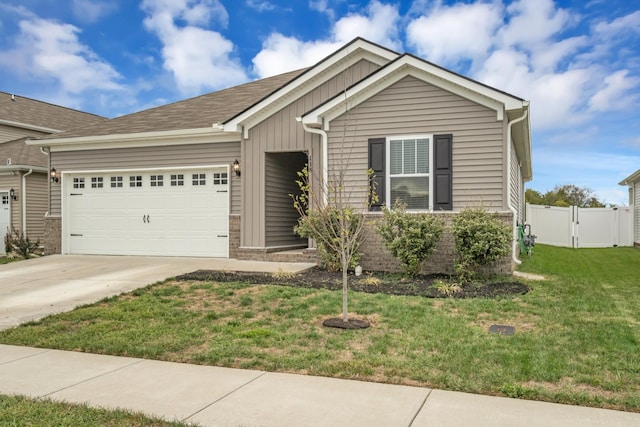118 Merion Way, Lebanon, TN 37087 - ranch-style home featuring a garage, a gate, concrete driveway, and board and batten siding