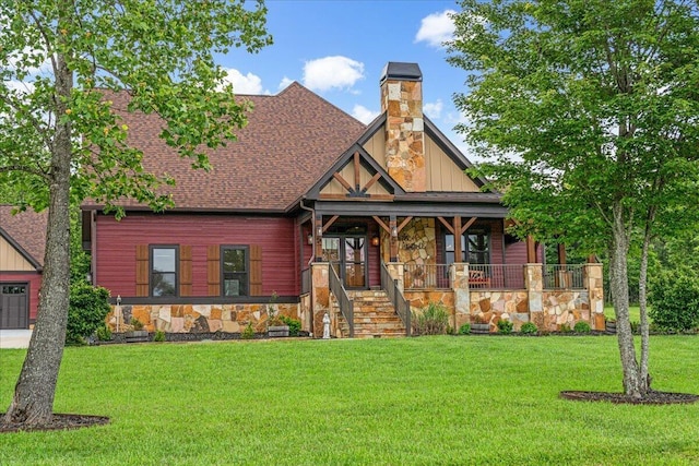 1165 River Bluffs Dr Unit Rb-97, Jasper, TN 37347 - view of front of house featuring stone siding, covered porch, a front lawn, a shingled roof, and a chimney