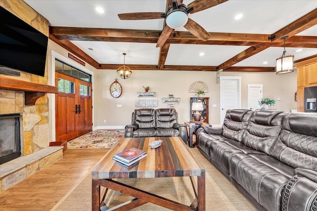1165 River Bluffs Dr Unit Rb-97, Jasper, TN 37347 - living room featuring beamed ceiling, light wood-type flooring, baseboards, a fireplace, and a ceiling fan