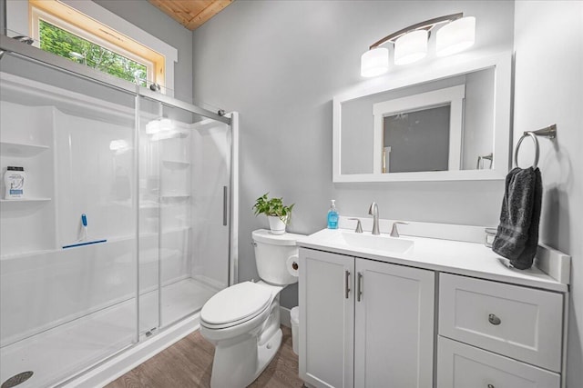 1165 River Bluffs Dr Unit Rb-97, Jasper, TN 37347 - full bathroom with a shower stall, toilet, vanity, and wood finished floors
