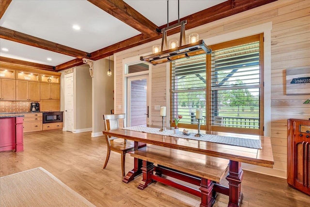 1165 River Bluffs Dr Unit Rb-97, Jasper, TN 37347 - dining space featuring beamed ceiling, light wood-style floors, wood walls, baseboards, and a chandelier