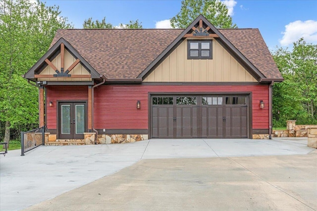 1165 River Bluffs Dr Unit Rb-97, Jasper, TN 37347 - view of front of home featuring french doors, a garage, concrete driveway, and roof with shingles