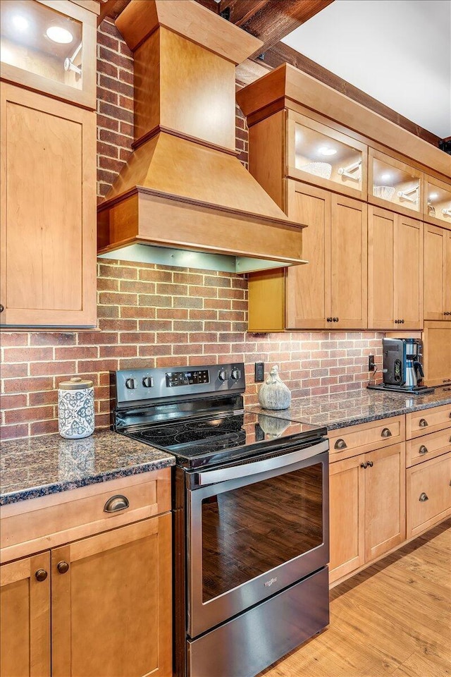 1165 River Bluffs Dr Unit Rb-97, Jasper, TN 37347 - kitchen with electric stove, custom range hood, decorative backsplash, and dark stone countertops