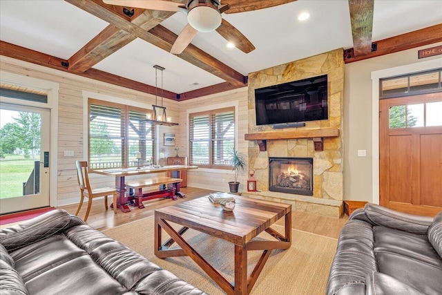 1165 River Bluffs Dr Unit Rb-97, Jasper, TN 37347 - living room featuring wood finished floors, a fireplace, beam ceiling, healthy amount of natural light, and a ceiling fan