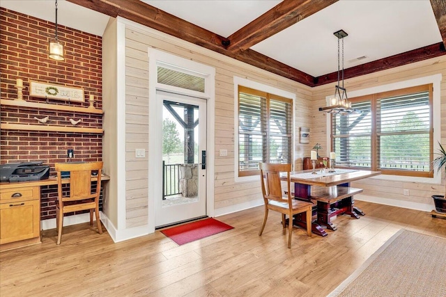 1165 River Bluffs Dr Unit Rb-97, Jasper, TN 37347 - dining room with light wood-type flooring, beamed ceiling, baseboards, a chandelier, and wooden walls