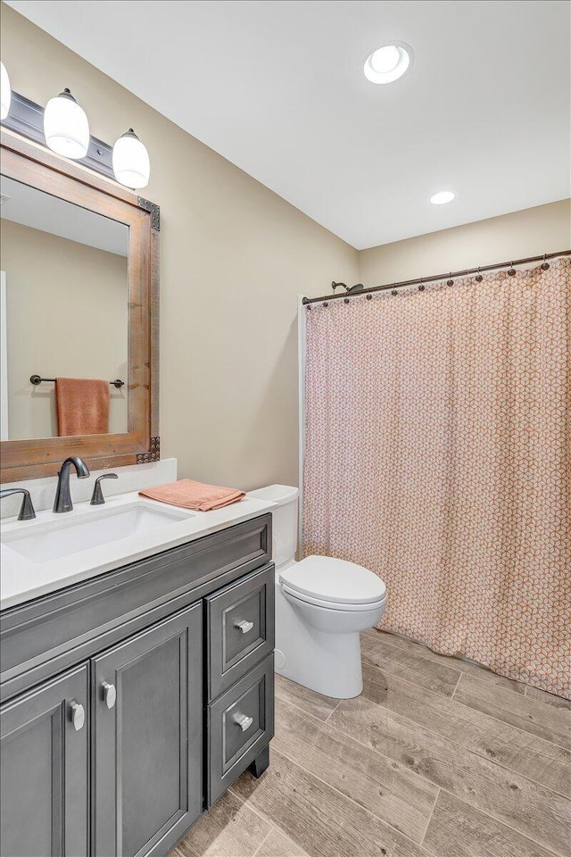 1165 River Bluffs Dr Unit Rb-97, Jasper, TN 37347 - bathroom with wood finished floors, vanity, toilet, and recessed lighting