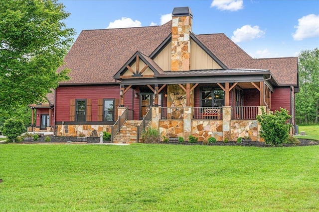 1165 River Bluffs Dr Unit Rb-97, Jasper, TN 37347 - view of front facade featuring stone siding, a front yard, a porch, and a shingled roof