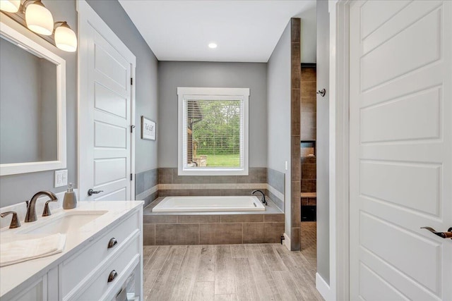 1165 River Bluffs Dr Unit Rb-97, Jasper, TN 37347 - full bath featuring vanity, a garden tub, and wood finished floors
