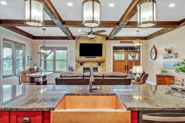 1165 River Bluffs Dr Unit Rb-97, Jasper, TN 37347 - kitchen featuring a sink, coffered ceiling, open floor plan, a fireplace, and ceiling fan