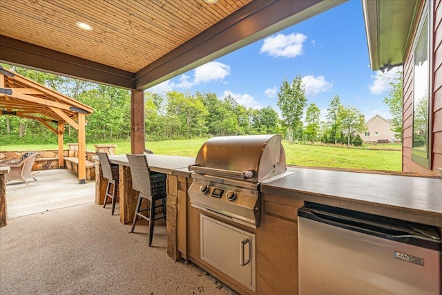 1165 River Bluffs Dr Unit Rb-97, Jasper, TN 37347 - view of patio with a bar, area for grilling, and a grill