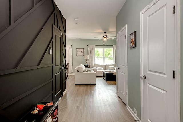 1017 Village Ct, Burns, TN 37029 - corridor with light wood finished floors and baseboards