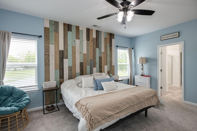 1017 Village Ct, Burns, TN 37029 - bedroom featuring light carpet, baseboards, and a ceiling fan