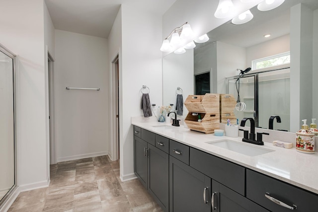 1017 Village Ct, Burns, TN 37029 - bathroom featuring a stall shower, double vanity, and baseboards